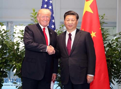 资料图:2017年7月8日,国家主席习近平在二十国集团领导人汉堡峰会闭幕后会见美国总统特朗普,就中美关系及共同关心的重大国际和地区问题深入交换意见。新华社记者 姚大伟 摄 图片来源:新华网